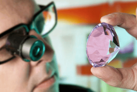 gemologist looking at diamond-412851-edited